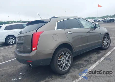 2015 Cadillac Srx Luxury Collection z USA, uszkodzony, nr VIN 3GYFNEE37FS519747